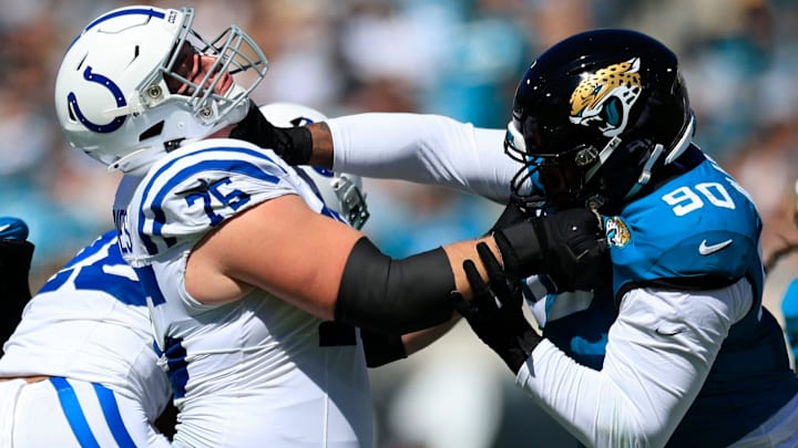 Colts guard Will Fries tangles with Jaguars defensive end Angelo Blackson. Fries is a top free agent but there's little to base his rise on beyond four strong games in 2024.