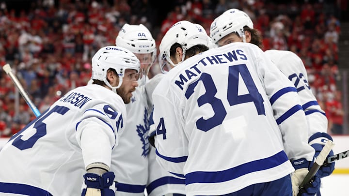 May 11, 2025; Sunrise, Florida, USA; Toronto Maple Leafs center Auston Matthews (34) talks with defenseman Oliver Ekman-Larsson (95), defenseman Morgan Rielly (44), left wing Matthew Knies (23) and right wing Mitch Marner (16) against the Florida Panthers during the third period in game four of the second round of the 2025 Stanley Cup Playoffs at Amerant Bank Arena. Mandatory Credit: Kim Klement Neitzel-Imagn Images