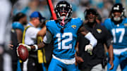 Jacksonville Jaguars wide receiver Travis Hunter (12) reacts to his carry during the first quarter of an NFL football matchup, Sunday, Oct. 12, 2025, at EverBank Stadium in Jacksonville, Fla. The Seahawks defeated the Jaguars 20-12.