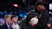 Jun 25, 2025; Brooklyn, NY, USA; Ace Bailey signs autographs before the 2025 NBA Draft at Barclays Center. Mandatory Credit: Brad Penner-Imagn Images