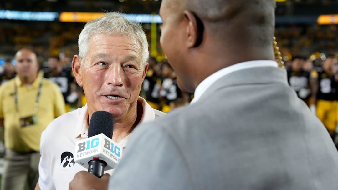 Iowa Hawkeyes head coach Kirk Ferentz is interviewed by the Big Ten Network after becoming the winningest coach in Big Ten history, passing Woody Hayes, with a win over the Massachusetts Minutemen Sept. 13, 2025 at Kinnick Stadium in Iowa City, Iowa.