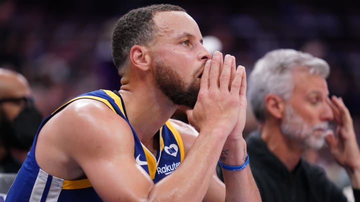 Apr 16, 2024; Sacramento, California, USA; Golden State Warriors guard Stephen Curry (30) sits on the bench during action against the Sacramento Kings in the fourth quarter during a play-in game of the 2024 NBA playoffs at the Golden 1 Center. Mandatory Credit: Cary Edmondson-USA TODAY Sports