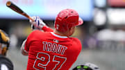 Angels designated hitter Mike Trout (27) double in the first inning against the Colorado Rockies at Coors Field on Sept. 21.