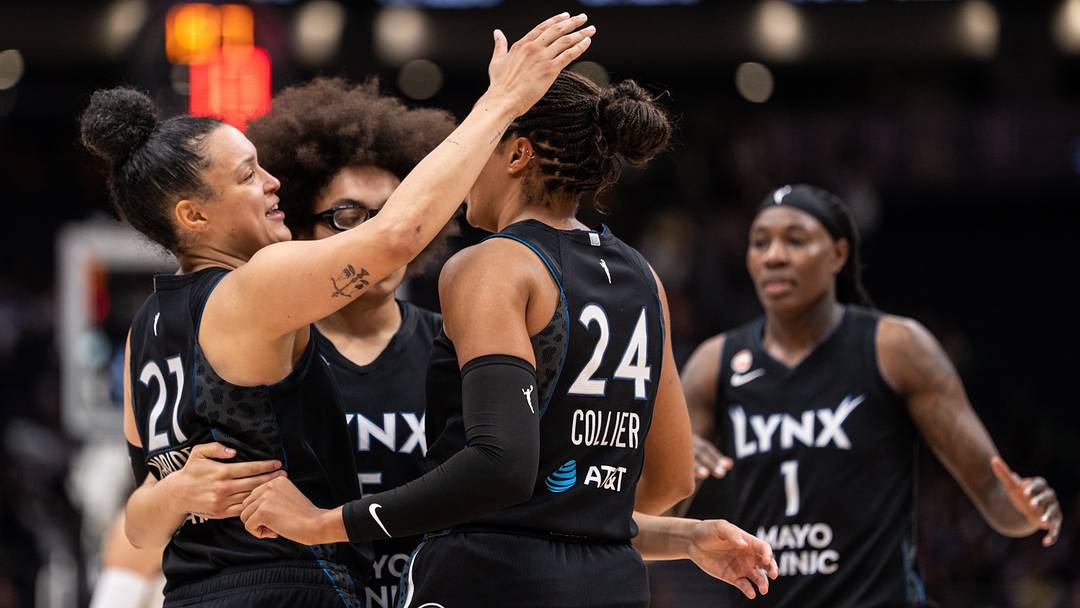 Jul 22, 2026; Seattle, Washington, USA;  Minnesota Lynx, from left, guard Kayla McBride (21), guard Olivia Miles (5) and forward Napheesa Collier (24) celebrate during the second half against the Seattle Storm at Climate Pledge Arena. Mandatory Credit: Stephen Brashear-Imagn Images