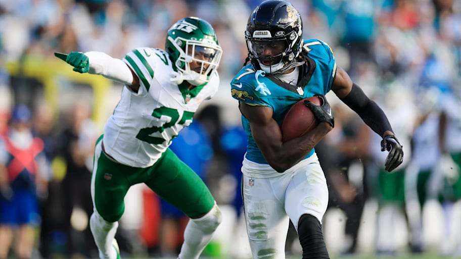 Jacksonville Jaguars wide receiver Brian Thomas Jr. (7) rushes for yards en route to a touchdown against New York Jets cornerback Kendall Sheffield (27) during the fourth quarter Sunday, Dec. 15, 2024 at EverBank Stadium in Jacksonville, Fla.  | Corey Perrine/Florida Times-Union / USA TODAY NETWORK via Imagn Images