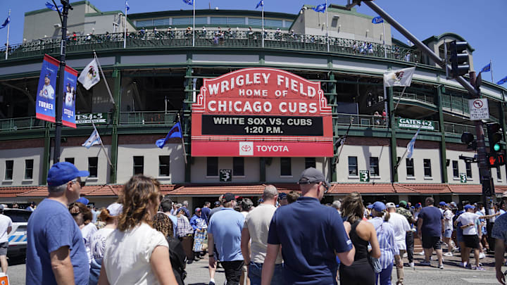 Chicago, Illinois, USA; Fans walk to the ballpark before a game between the Chicago Cubs and the Chicago White Sox at Wrigley Field. Chicago, Illinois, USA; Fans walk to the ballpark before a game between the Chicago Cubs and the Chicago White Sox at Wrigley Field.