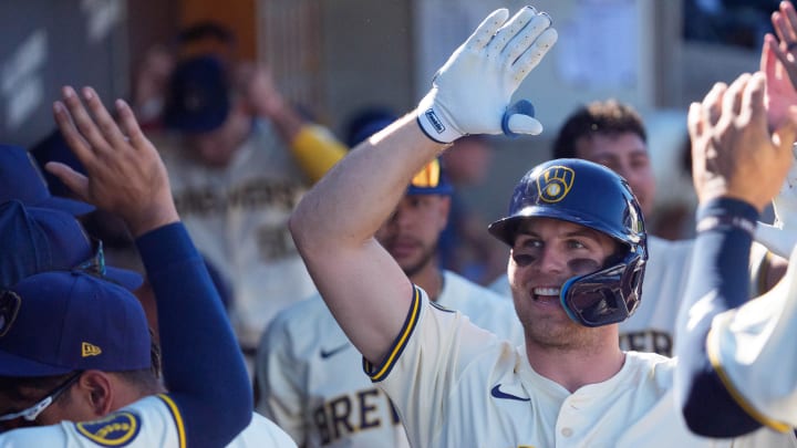 Mar 1, 2024; Phoenix, Arizona, USA;  Milwaukee Brewers outfielder Brewer Hicklen (75) celebrates with his team after hitting a home run  in the eighth inning during a spring training game against the San Diego Padres at American Family Fields of Phoenix.