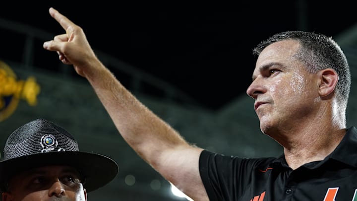 Oct 21, 2023; Miami Gardens, Florida, USA; Miami Hurricanes head coach Mario Cristobal celebrates after defeating the Clemson Tigers at Hard Rock Stadium. Mandatory Credit: Rich Storry-Imagn Images