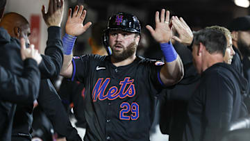 Sep 2, 2024; New York City, New York, USA;  New York Mets left fielder DJ Stewart (29) celebrates in the dugout with his teammates after scoring a run in the fourth inning against the Boston Red Sox at Citi Field. Mandatory Credit: Wendell Cruz-Imagn Images