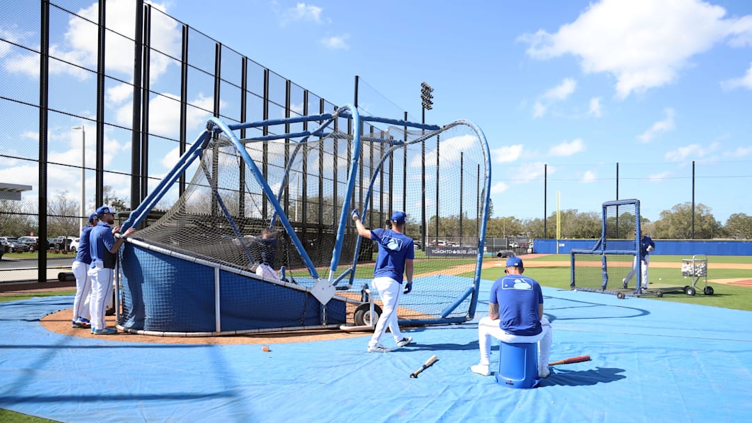 Feb 15, 2025; Dunedin, FL, USA; Toronto Blue Jays outfielder Jonatan Clase (8) takes batting practice during spring training workouts at TD Ballpark. Mandatory Credit: Kim Klement Neitzel-Imagn Images