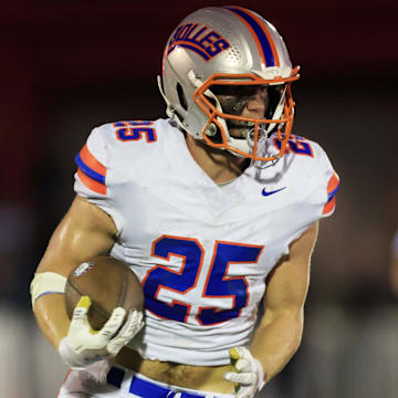 Bolles' Xander Edwards (25), a 6-foot-2, 215-pound sophomore, set Florida's record for rushing touchdowns in a game with eight on Friday night in a blowout win over Baldwin. Edwards broke former Yulee star Derrick Henry's record of six rushing TDs.