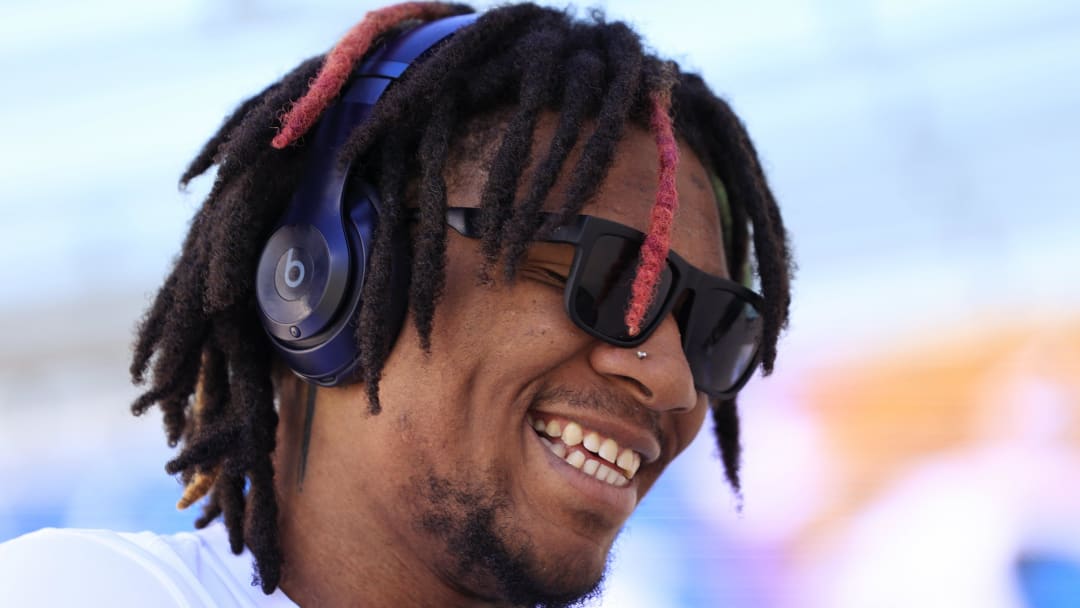 Indianapolis Colts quarterback Anthony Richardson (5) smiles while signing autographs before an NFL football matchup against the Jacksonville Jaguars Sunday, Oct. 15, 2023 at EverBank Stadium in Jacksonville, Fla. Richardson is on injured reserve after suffering a shoulder injury in week 5 against the Tennessee Titans. [Corey Perrine/Florida Times-Union]