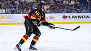 Dec 23, 2024; Vancouver, British Columbia, CAN; Vancouver Canucks forward Elias Pettersson (40) skates against the San Jose Sharks during the first period at Rogers Arena. Mandatory Credit: Bob Frid-Imagn Images