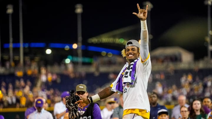 Jun 26, 2023; Omaha, NE, USA; LSU Tigers first baseman Tre' Morgan (18) celebrates after winning the College World Series over the Florida Gators at Charles Schwab Field Omaha. Mandatory Credit: Dylan Widger-Imagn Images