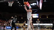 Nov 27, 2025; San Diego, CA, USA; Wisconsin Badgers forward Austin Rapp (22) shoots the ball against Providence Friars during the second half at Jenny Craig Pavilion. 