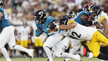 Aug 9, 2025; Jacksonville, Florida, USA; Pittsburgh Steelers defensive tackle Isaiahh Loudermilk (92) tackles Jacksonville Jaguars running back Bhayshul Tuten (33) during the second quarter at EverBank Stadium. 
