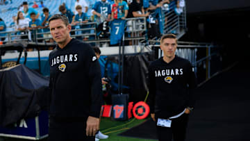 Jacksonville Jaguars Executive Vice President of football operations Tony Boselli, left, and General Manager James Gladstone walks on the field before an NFL football matchup at EverBank Stadium, Monday, Oct. 6, 2025, in Jacksonville, Fla. 
