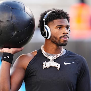 Nov 29, 2024; Boulder, Colorado, USA; Colorado Buffaloes quarterback Shedeur Sanders (2) before the game against the Oklahoma State Cowboys at Folsom Field. Mandatory Credit: Ron Chenoy-Imagn Images