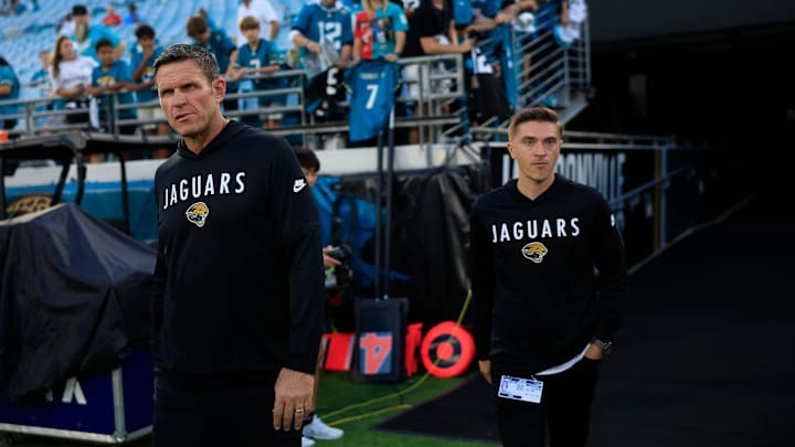 Jacksonville Jaguars Executive Vice President of football operations Tony Boselli, left, and General Manager James Gladstone walks on the field before an NFL football matchup at EverBank Stadium, Monday, Oct. 6, 2025, in Jacksonville, Fla. 