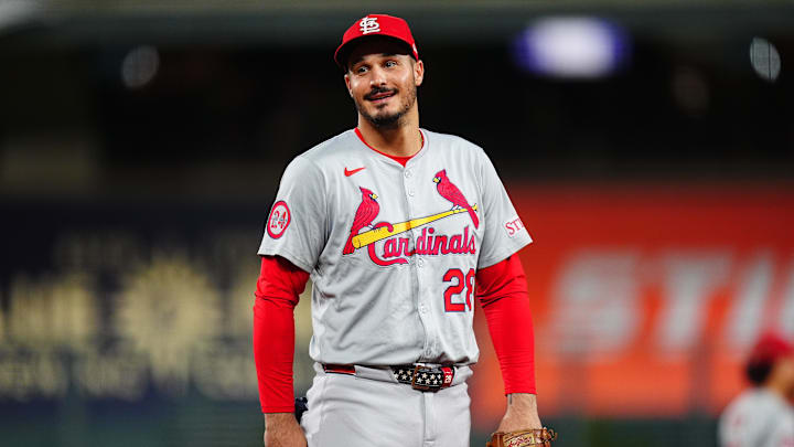 Sep 25, 2024; Denver, Colorado, USA; St. Louis Cardinals third base Nolan Arenado (28) reacts in the third inning against the Colorado Rockies at Coors Field. Mandatory Credit: Ron Chenoy-Imagn Images