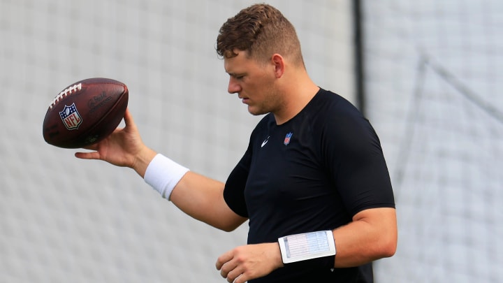 Jacksonville Jaguars quarterback Mac Jones (10) spins the ball during a combined NFL football training camp session between the Tampa Bay Buccaneers and Jacksonville Jaguars Wednesday, Aug. 14, 2024 at EverBank Stadium’s Miller Electric Center in Jacksonville, Fla.