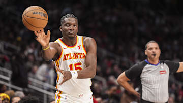 Jan 25, 2025; Atlanta, Georgia, USA; Atlanta Hawks center Clint Capela (15) inbounds the ball against the Toronto Raptors during the first half at State Farm Arena. Mandatory Credit: Dale Zanine-Imagn Images