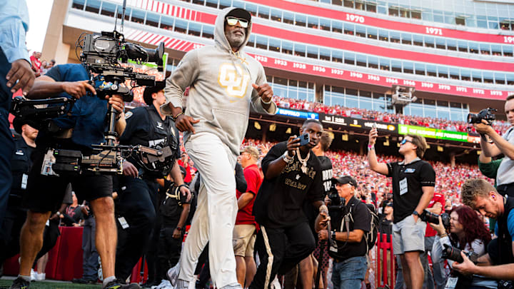 Colorado head coach Deion Sanders and the Buffaloes face Colorado State on Saturday. The Buffaloes won in double overtime last season.