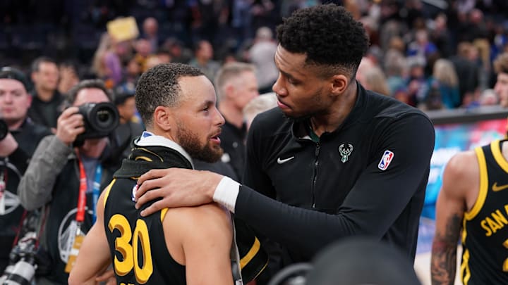 Mar 6, 2024; San Francisco, California, USA; Milwaukee Bucks forward Giannis Antetokounmpo (34) and Golden State Warriors guard Stephen Curry (30) meet after the game at the Chase Center. Mandatory Credit: Cary Edmondson-Imagn Images