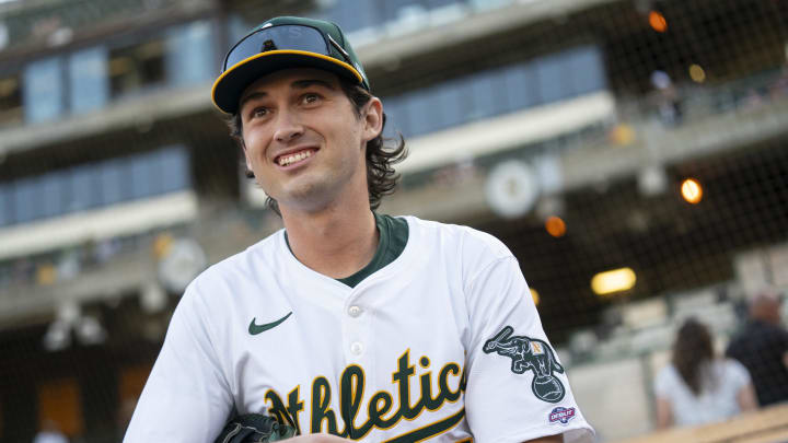 Jul 19, 2024; Oakland, California, USA; Oakland Athletics shortstop Jacob Wilson (5) walks towards the field before the start of the game against the Los Angeles Angels at Oakland-Alameda County Coliseum. Mandatory Credit: Cary Edmondson-USA TODAY Sports