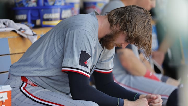 Jul 28, 2024; Detroit, Michigan, USA;  Minnesota Twins starting pitcher Bailey Ober (17) sits in dugout in the ninth inning against the Detroit Tigers at Comerica Park. Mandatory Credit: Rick Osentoski-Imagn Images