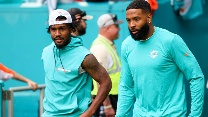 Miami Dolphins wide receiver Jaylen Waddle (17) and Miami Dolphins wide receiver Odell Beckham Jr. (3) walk onto the field for warm ups before a  preseason game against the Atlanta Falcons at Hard Rock Stadium. Mandatory Credit: Nathan Ray Seebeck-USA TODAY Sports