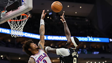 Kelly Oubre Jr., Bobby Portis Sr.