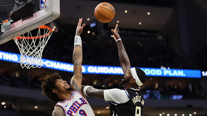 Kelly Oubre Jr., Bobby Portis Sr.