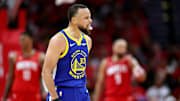 Curry brilló en la primera victoria de los Warriors 