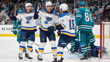 Apr 6, 2024; San Jose, California, USA; St. Louis Blues center Brayden Schenn (10) celebrates with center Jordan Kyrou (25) and center Robert Thomas (18) after scoring the game-tying goal against the San Jose Sharks during the third period at SAP Center at San Jose. Mandatory Credit: Robert Edwards-USA TODAY Sports