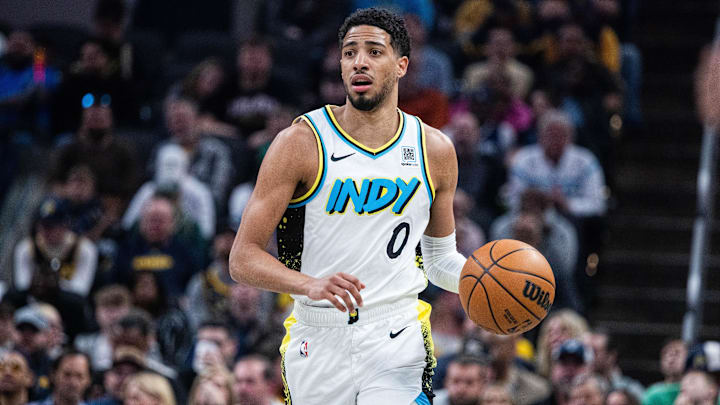 Mar 11, 2025; Indianapolis, Indiana, USA;Indiana Pacers guard Tyrese Haliburton (0) dribbles the ball in the first half against the Milwaukee Bucks  at Gainbridge Fieldhouse. Mandatory Credit: Trevor Ruszkowski-Imagn Images