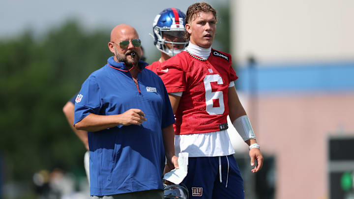 Jul 23, 2025; East Rutherford, NJ, USA; New York Giants head coach Brian Daboll and quarterback Jaxson Dart (6) during training camp at Quest Diagnostics Training Center. Mandatory Credit: Vincent Carchietta-Imagn Images
