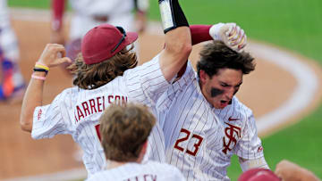 Florida St. outfielder Brody DeLamielleure (23) celebrates his two-run home run with outfielder Gage Harrelson (9) during the fourth inning of an NCAA college baseball matchup Tuesday, March 25, 2025 at VyStar Ballpark in Jacksonville, Fla. FSU rallied to defeat UF 8-4 off a walk-off grand slam from Alex Lodise in the ninth inning. [Corey Perrine/Florida Times-Union]