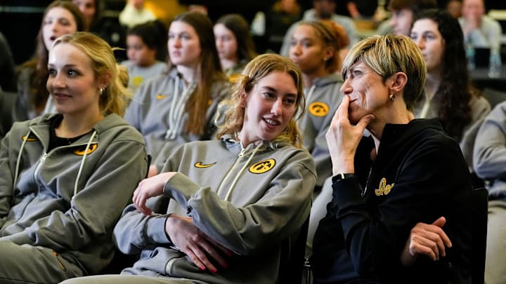 Iowa Lucy Olsen and Head Coach Jan Jensen talk during a watch party for the the NCAA Women’s Basketball Tournament bracket reveal Sunday, March 16, 2025 at Carver-Hawkeye Arena in Iowa City, Iowa.