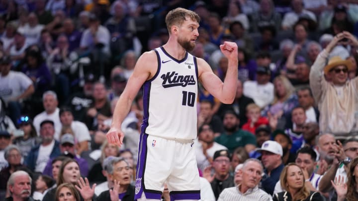 Apr 16, 2024; Sacramento, California, USA; Sacramento Kings forward Domantas Sabonis (10) pumps his fist after the Kings made a basket against the Golden State Warriors in the fourth quarter during a play-in game of the 2024 NBA playoffs at the Golden 1 Center. Mandatory Credit: Cary Edmondson-USA TODAY Sports