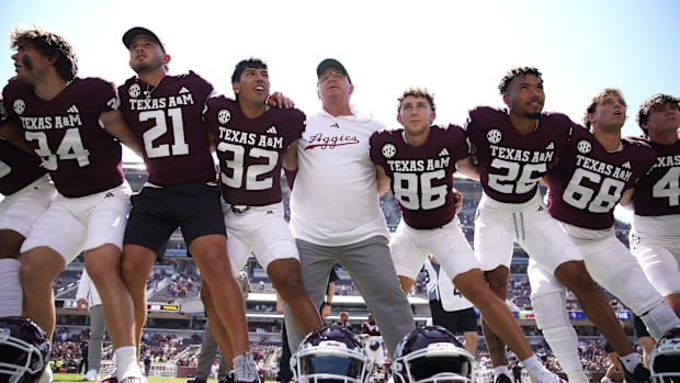 Sep 7, 2024; College Station, Texas, USA; Texas A&M Aggies head coach Mike Elko celebrates a 52-10 win against the McNees