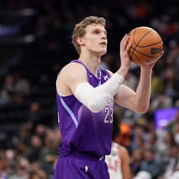 Mar 17, 2025; Salt Lake City, Utah, USA;  Utah Jazz forward Lauri Markkanen (23) shoots a technical free throw during the first quarter against the Chicago Bulls at Delta Center. Mandatory Credit: Chris Nicoll-Imagn Images