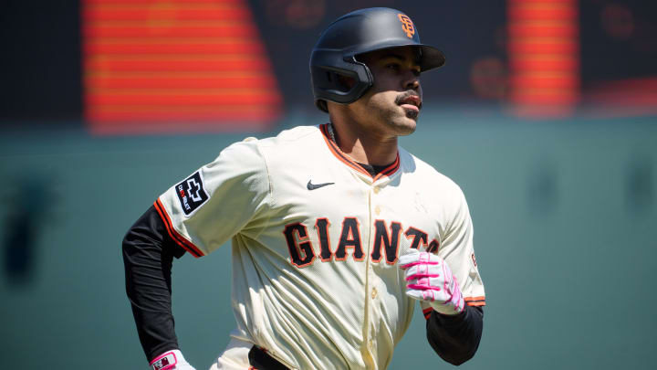 May 12, 2024; San Francisco, California, USA; San Francisco Giants infielder LaMonte Wade Jr. (31) runs the bases after hitting a two run home run against the Cincinnati Reds during the fifth inning at Oracle Park