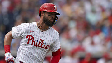 Philadelphia Phillies second baseman Weston Wilson (37) runs to first on a base hit against the Toronto Blue Jays in the second inning at BayCare Ballpark