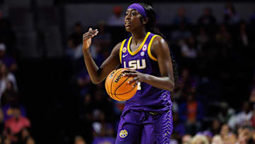 Jan 19, 2025; Gainesville, Florida, USA; LSU Tigers guard Flau'Jae Johnson (4) gestures against the Florida Gators during the first half at Exactech Arena at the Stephen C. O'Connell Center.