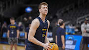 Mar 27, 2025; Atlanta, GA, USA; Michigan Wolverines center Danny Wolf (1) shoots on the court during practice at State Farm Arena. Mandatory Credit: Dale Zanine-Imagn Images