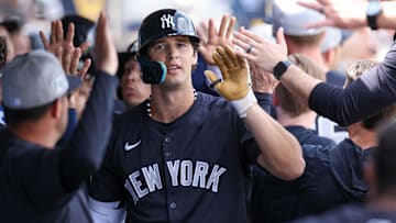 New York Yankees outfielder Spencer Jones celebrates after hitting a three-run home run against the Philadelphia Phillies during a spring training game at BayCare Ballpark.