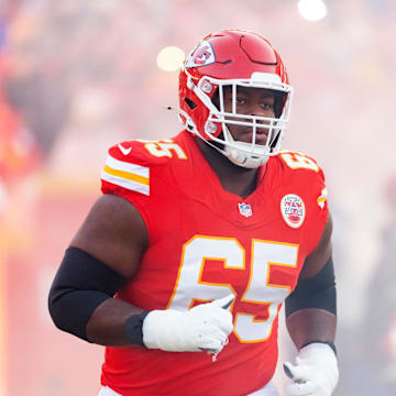 Jan 26, 2025; Kansas City, MO, USA; Kansas City Chiefs guard Trey Smith (65) against the Buffalo Bills in the AFC Championship game at GEHA Field at Arrowhead Stadium. Mandatory Credit: Mark J. Rebilas-Imagn Images