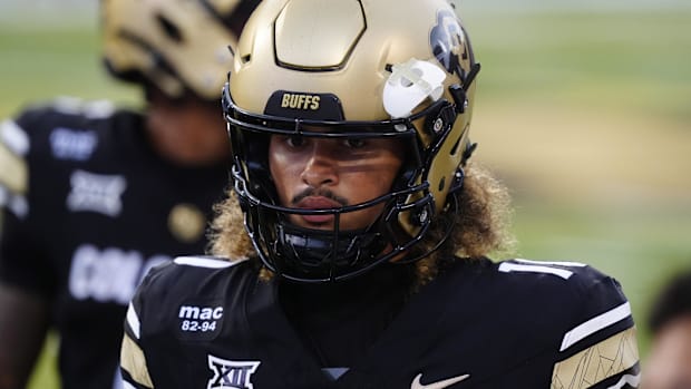 Colorado Buffaloes quarterback Julian Lewis (10) warms up in the second quarter against the Georgia Tech Yellow Jackets at Fo