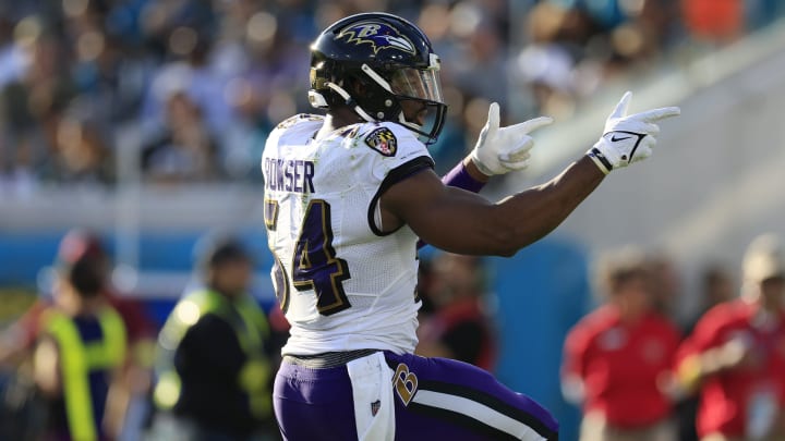 Baltimore Ravens linebacker Tyus Bowser (54) signals a first down pick up during the third quarter of a regular season NFL football matchup Sunday, Nov. 27, 2022 at TIAA Bank Field in Jacksonville. The Jaguars edged the Ravens 28-27. [Corey Perrine/Florida Times-Union]

Jki 112722 Nfl Ravens Jags 50